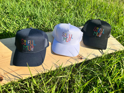 90s kid Multi-Color Soulful Muse Trucker Hat. Black, Navy, and white hats